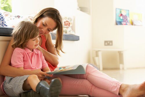 A mother and child reading together.