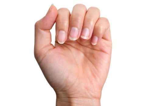 A woman with healthy nails.