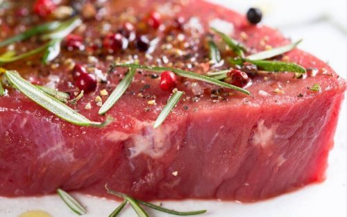 Marinated beef steak with herbs.