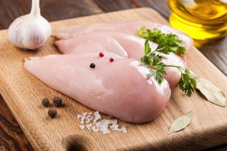 Uncooked chicken breasts.
