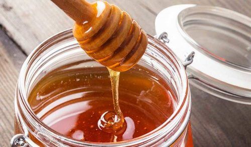 Glass jar of honey delicious and antibiotic for your skin