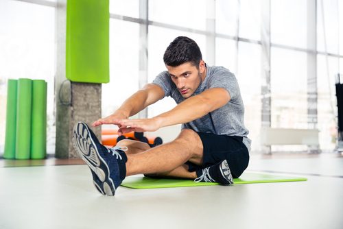 A man doing abdominal crunches.