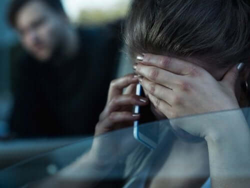 A woman calling 911.