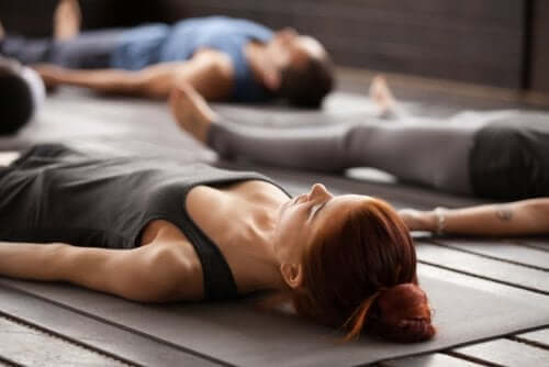 People doing yoga.
