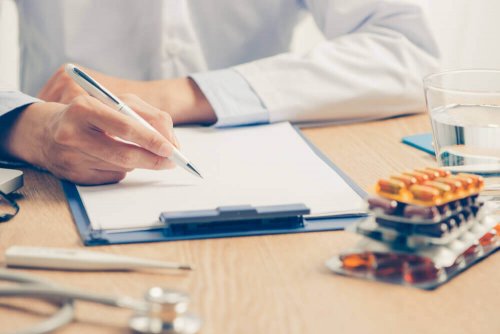 A doctor programming infusion pump dosage.