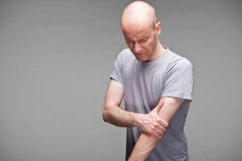 A man with biceps and shoulder pain.