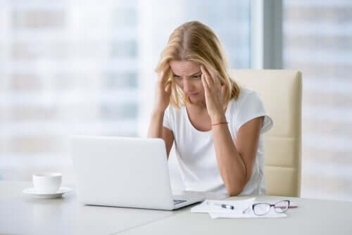 Stressed woman at work