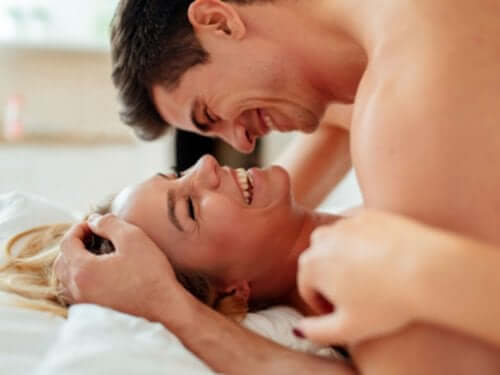 A woman and a man enjoying each other.