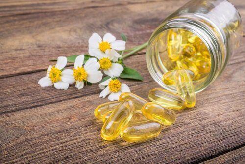 A jar with vitamin E capsules.