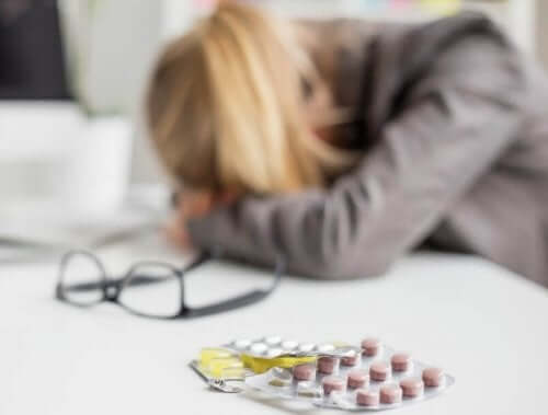 Woman sitting at a desk sad HIV treatment abacavir