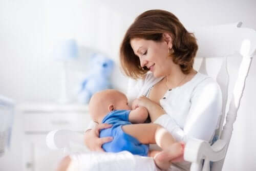 A mother breastfeeding her baby.