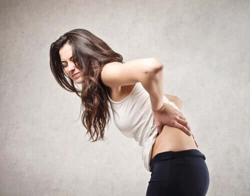 A woman with back pain.