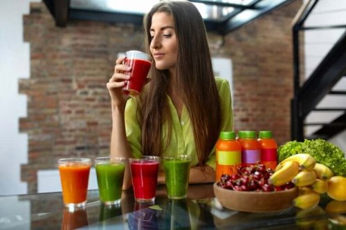 A woman drinking fruit juice.