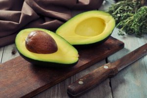 An avocado cut in half.