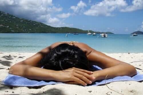 A woman sunbathing.