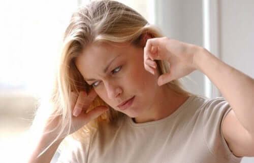 A woman with an earache.