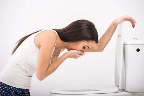 A person vomiting after taking Allopurinol.