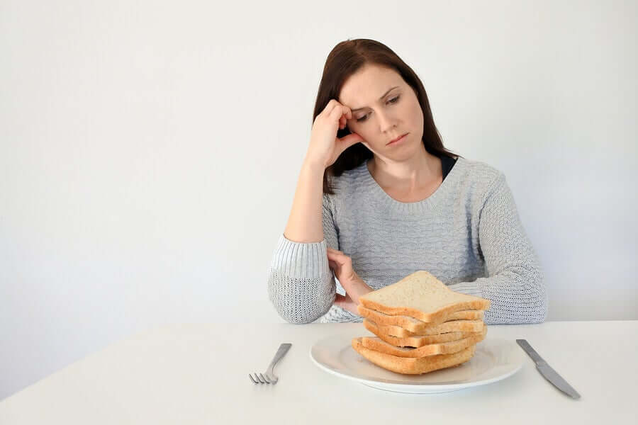 A woman thinking about Celiac disease in children.