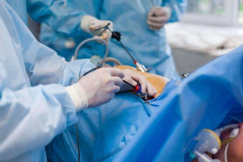 Doctors performing a surgery.