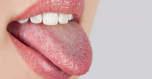 A person sticking their tongue out.