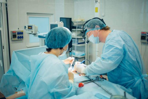 A surgeon operating.