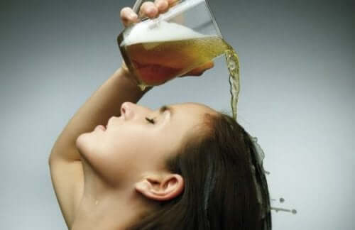 A woman rinsing her hair.