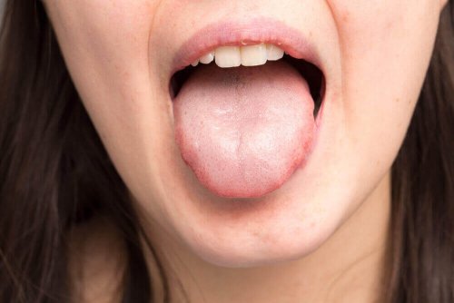 A woman sticking out her tongue.