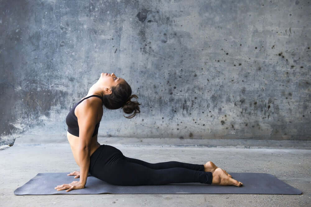The cobra pose is one of the best yoga poses to work your abs.