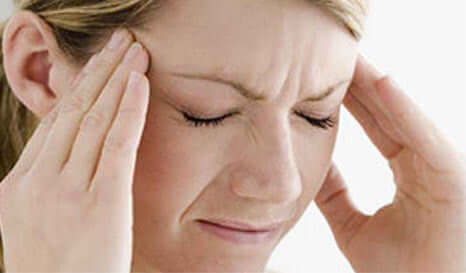 A lady with a headache.