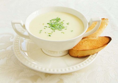 A bowl of cream of asparagus soup.