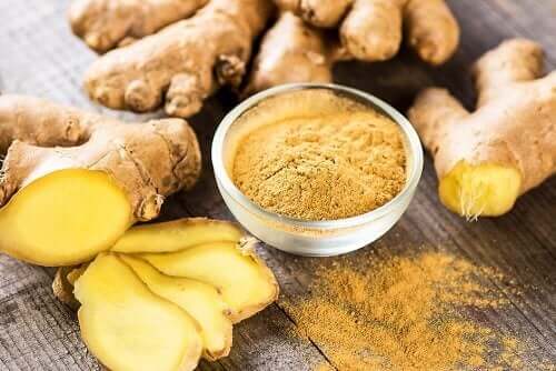 Ginger and ground ginger on a table.