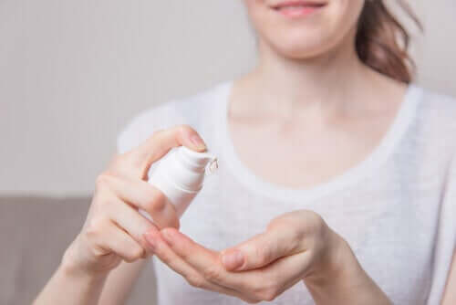 A lady applying disinfectant gels for coronavirus