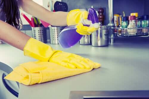 Someone cleaning surfaces.