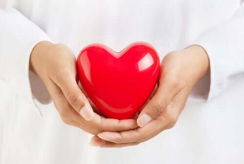 A person holding a heart.
