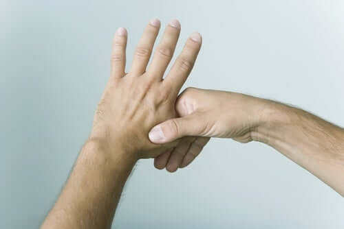 A man pressing his hand.