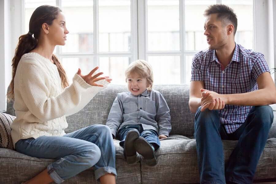 Parents arguing in front of their child.