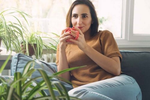 A woman drinking coffee.