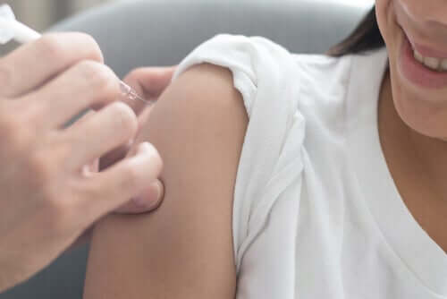 A young woman getting an HPV vaccine.