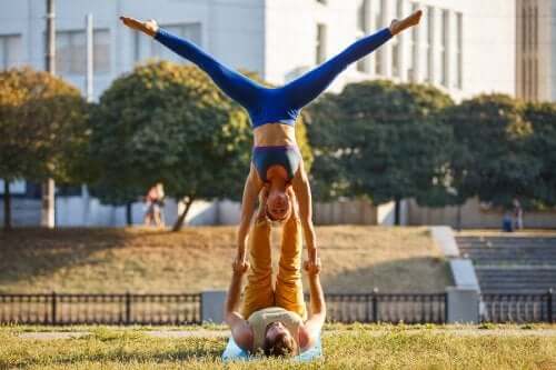 A couple doing acroyoga.