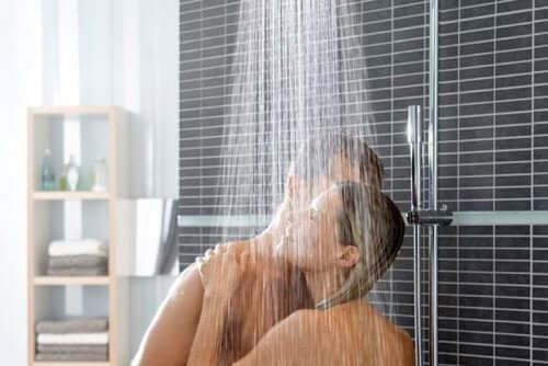 Couple showering together.
