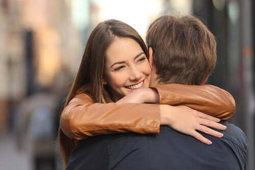 A couple hugging each other.