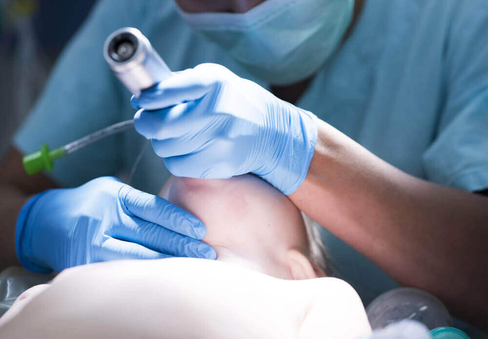 A child being intubated.