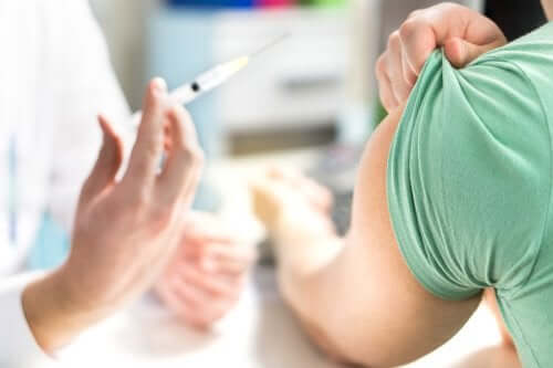 A man getting vaccinated.