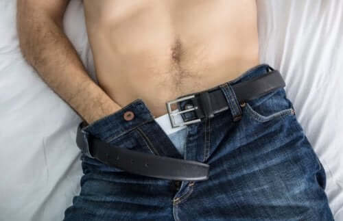 A man masturbating.