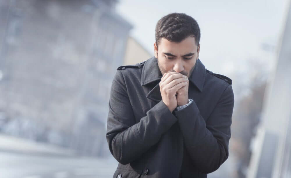 A man who is afraid of contracting coronavirus.
