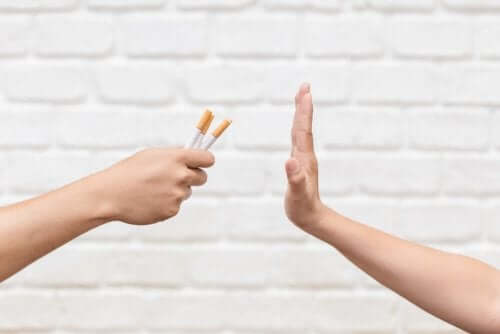 A person saying no to smoking.