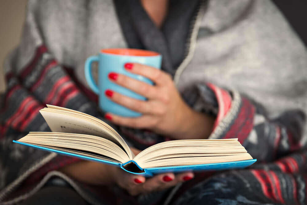 A woman reading during quarantine.