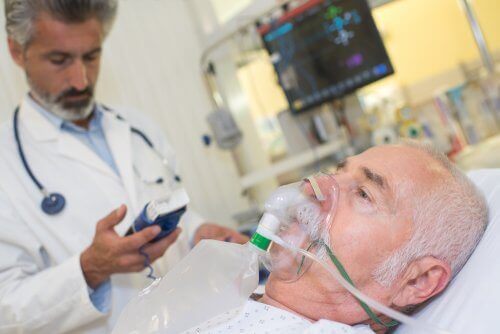A man receiving oxygen.
