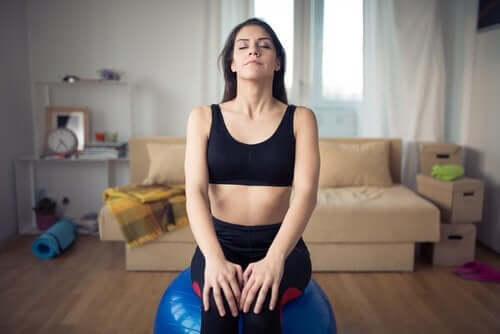 A woman breathing deeply.