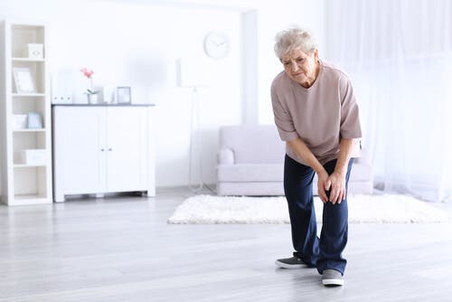 An elderly woman with arthritis.